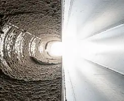 air duct cleaning services showing interior duct system inspection and cleaning in Cambridge, MA